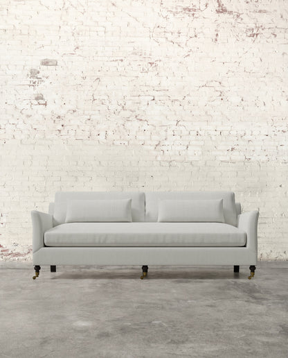 Alfie 87" Bench Sofa with Brass Casters