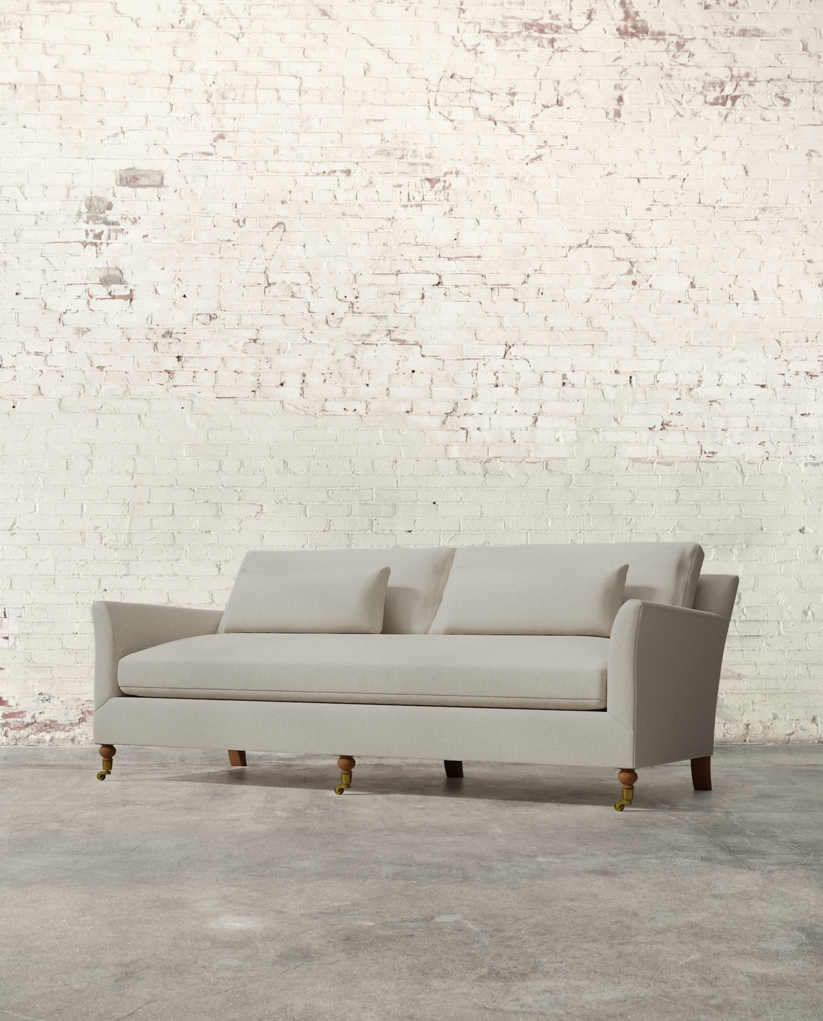 Alfie 87" Bench Sofa with Brass Casters