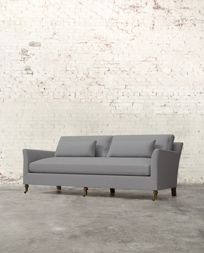 Alfie 87" Bench Sofa with Brass Casters