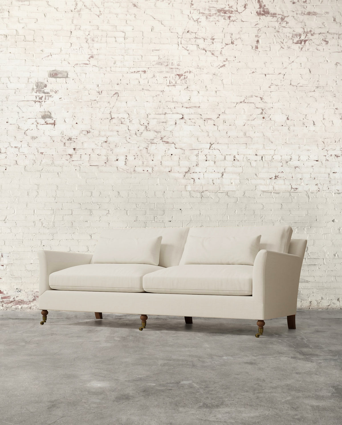 Alfie 87" Sofa with Brass Casters