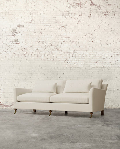 Alfie 87" Sofa with Brass Casters