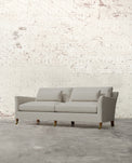 Alfie 87" Bench Sofa with Brass Casters