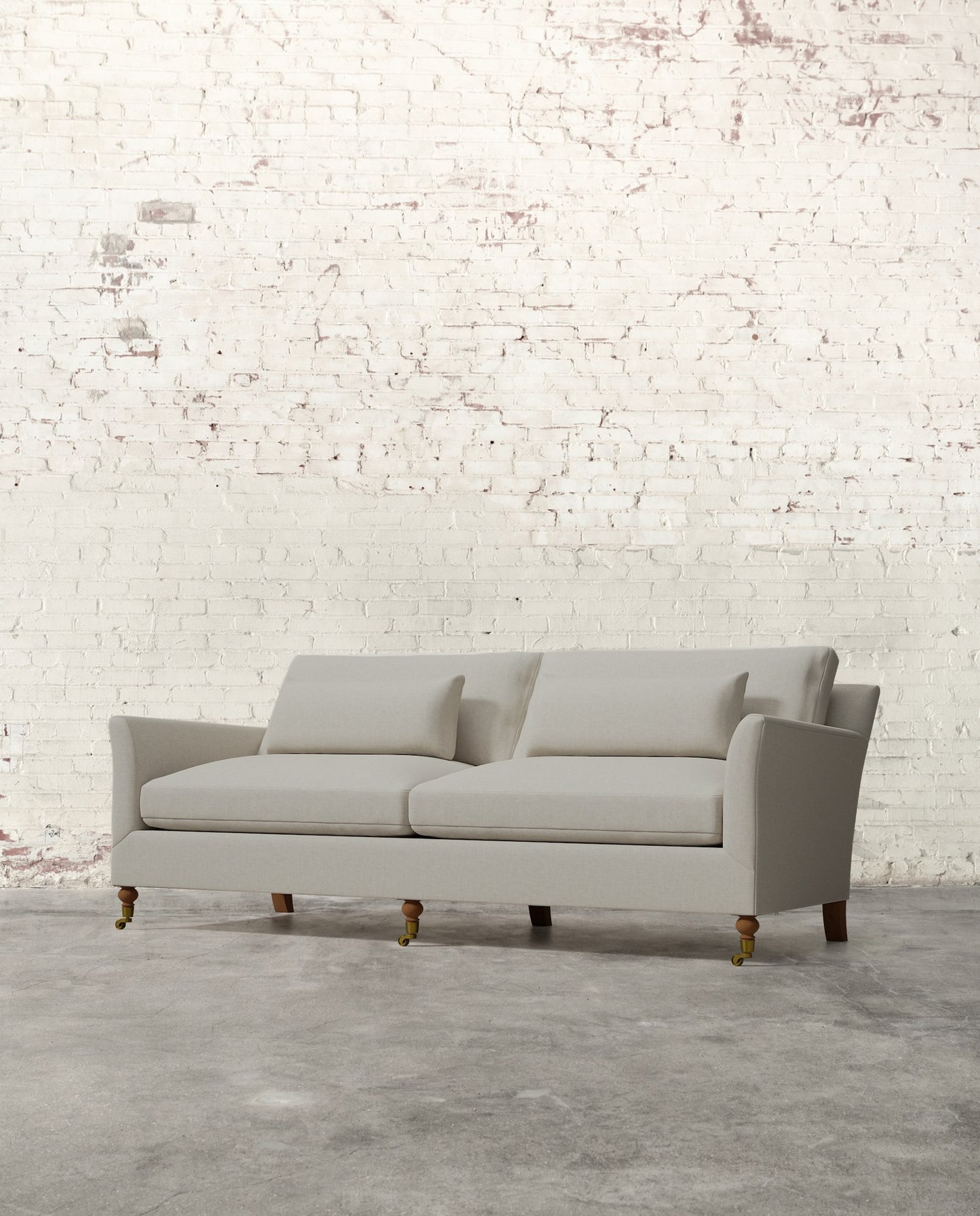 Alfie 87" Bench Sofa with Brass Casters