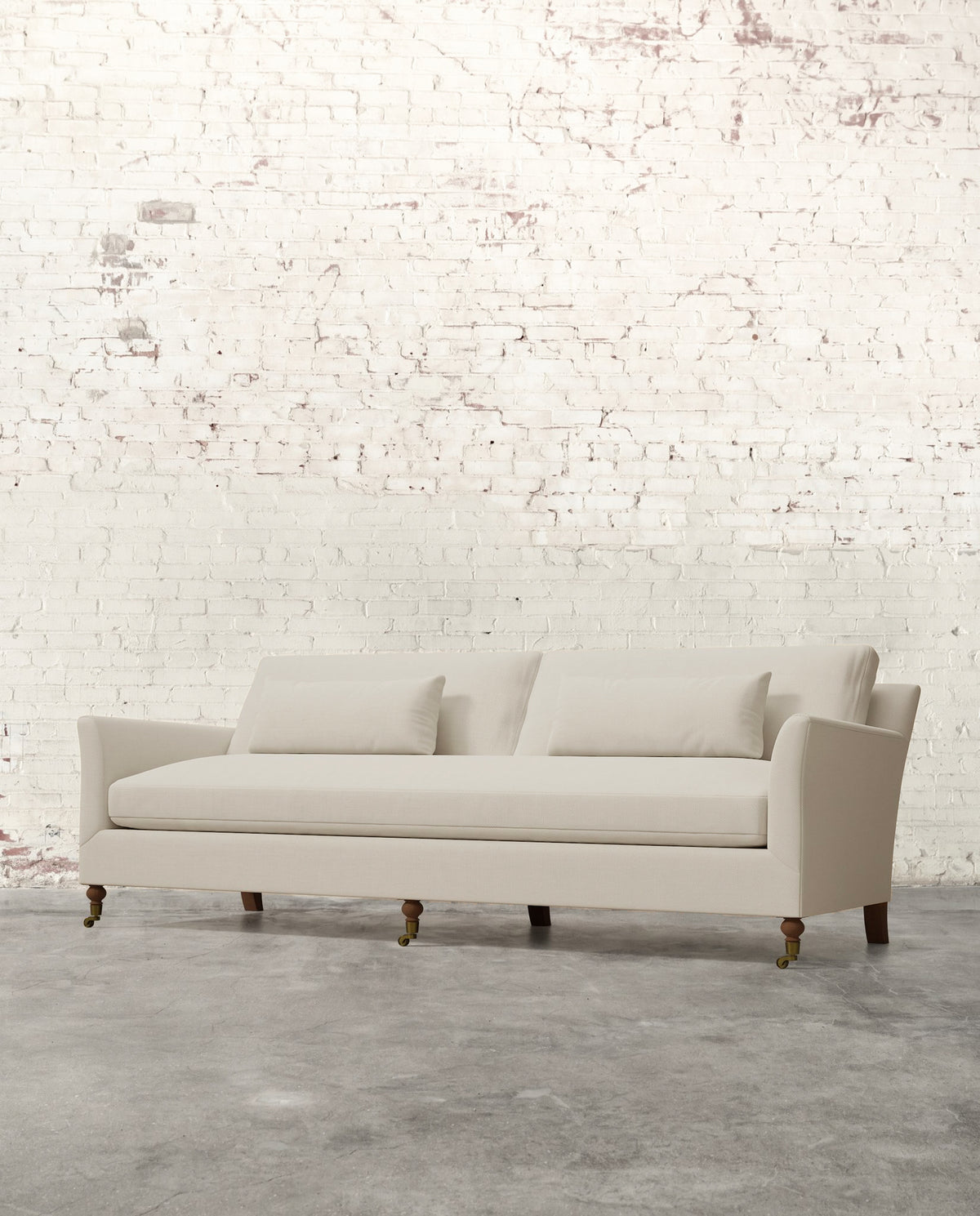 Alfie 97" Bench Sofa with Brass Casters