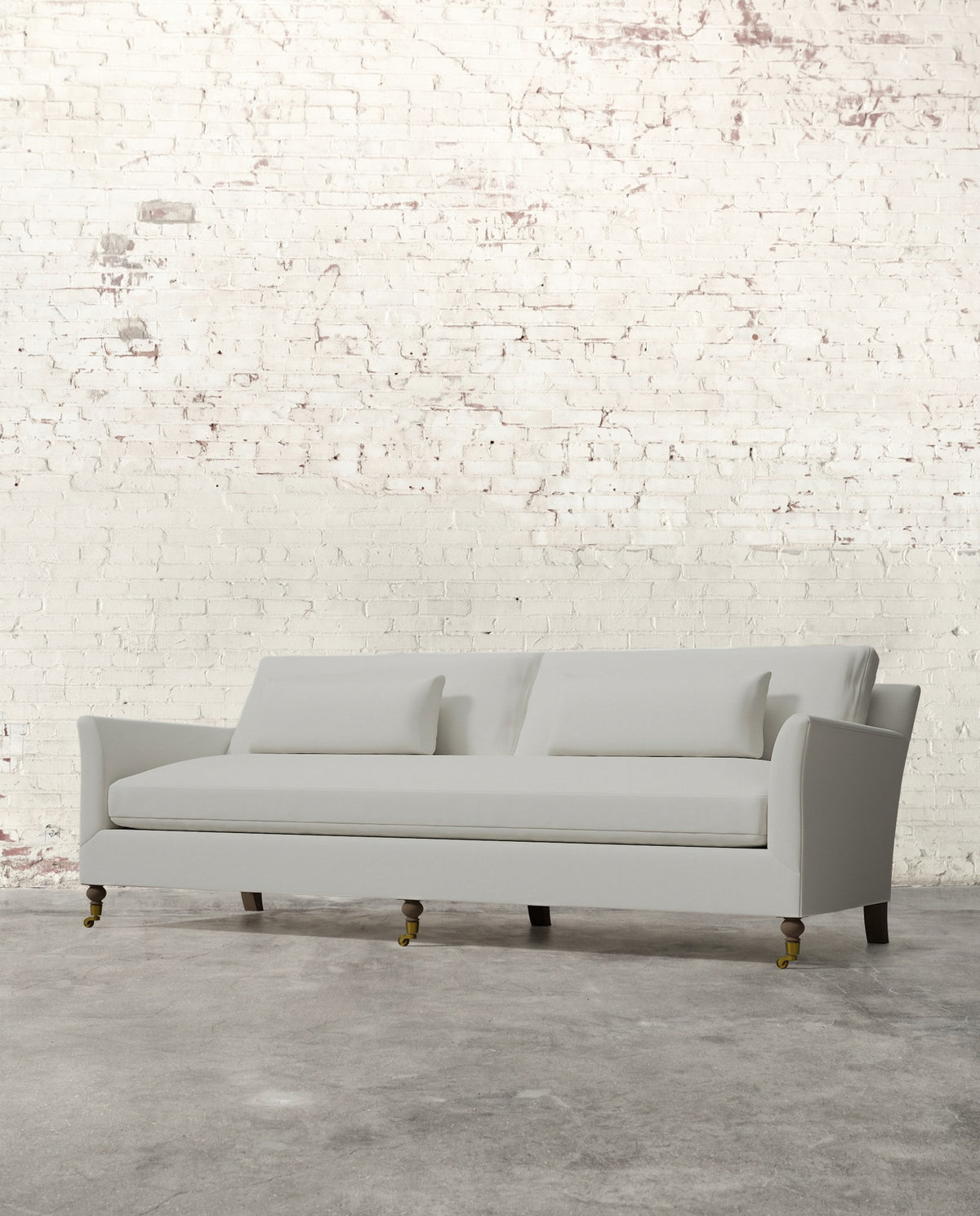 Alfie 97" Bench Sofa with Brass Casters