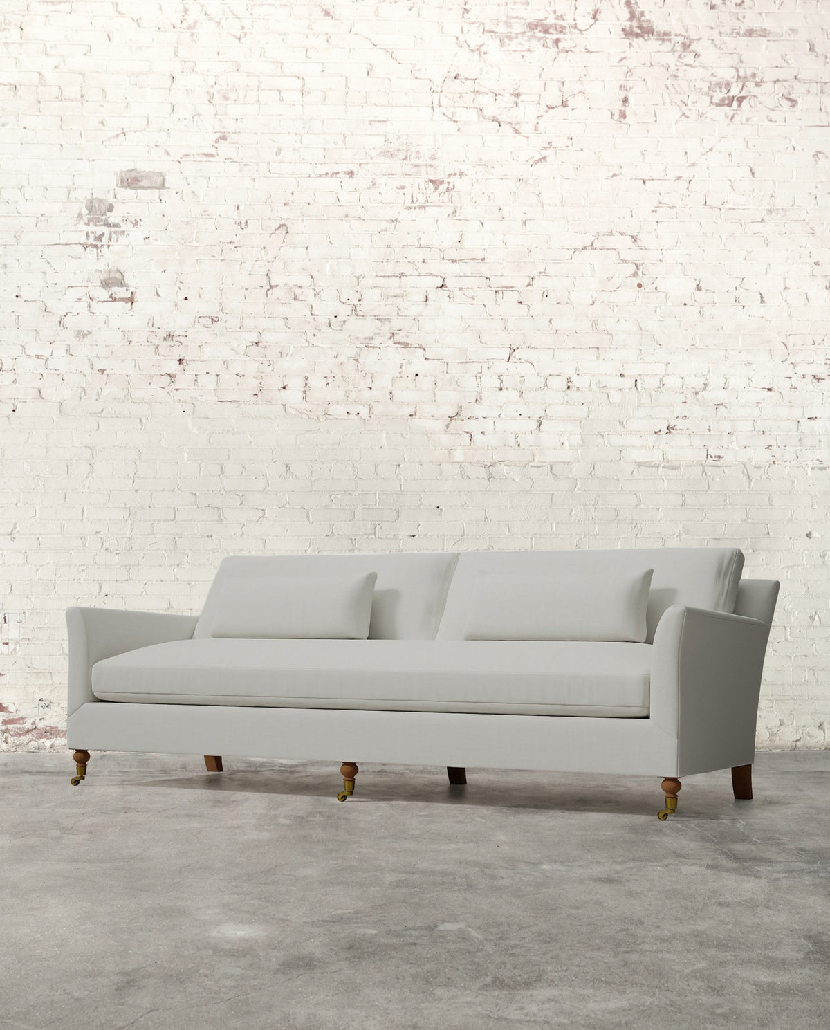 Alfie 97" Bench Sofa with Brass Casters