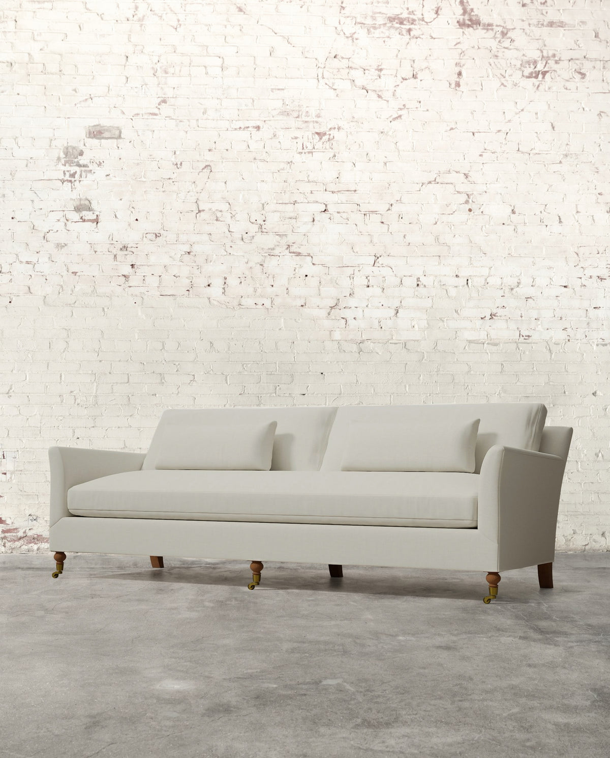 Alfie 97" Bench Sofa with Brass Casters
