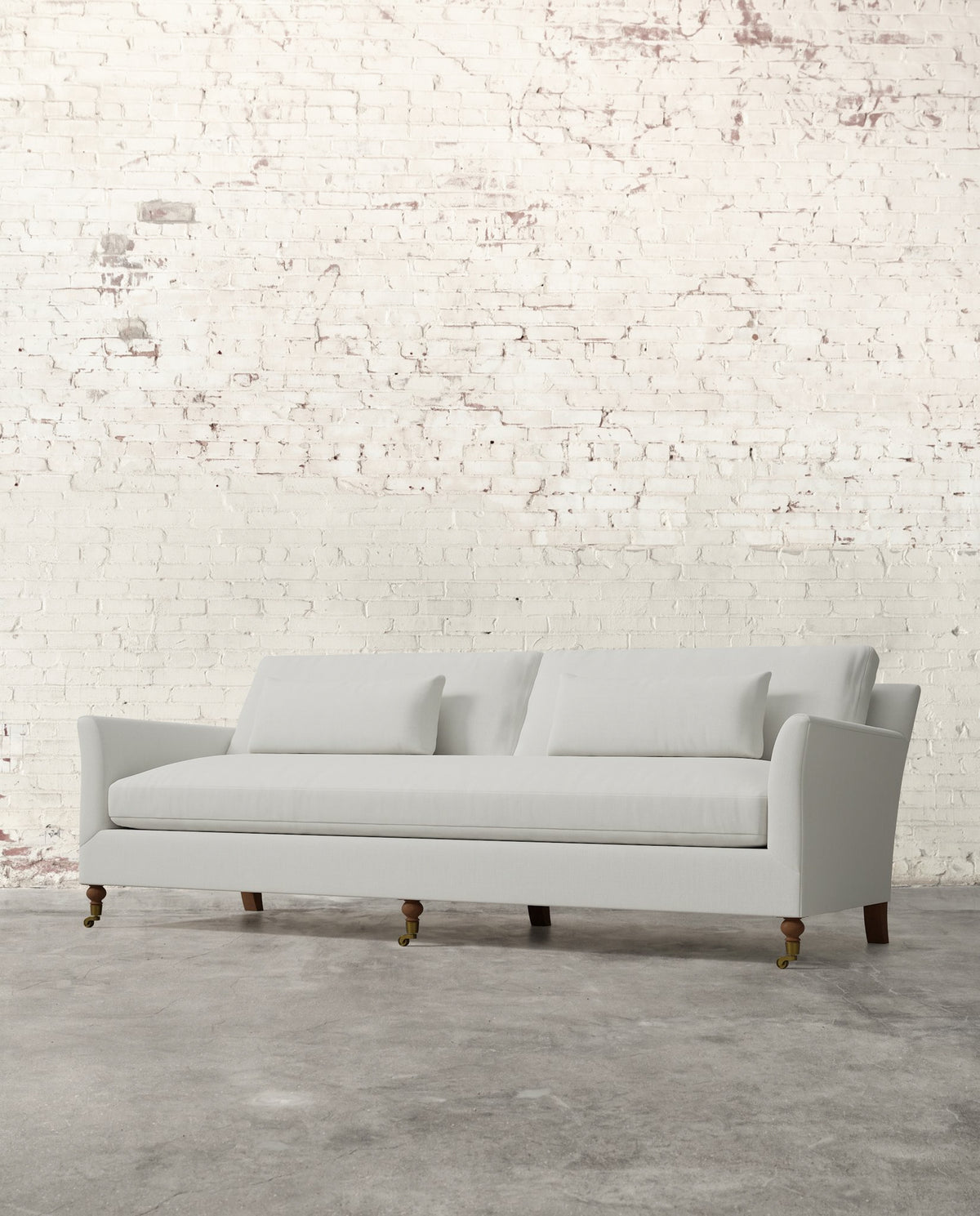 Alfie 97" Bench Sofa with Brass Casters