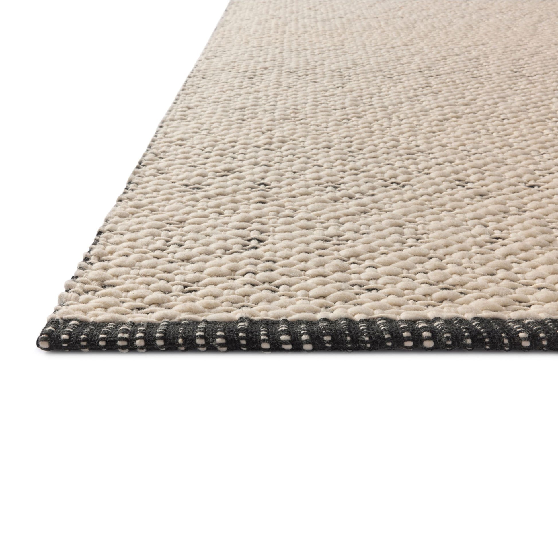 Betty Ivory Black Rug corner up close