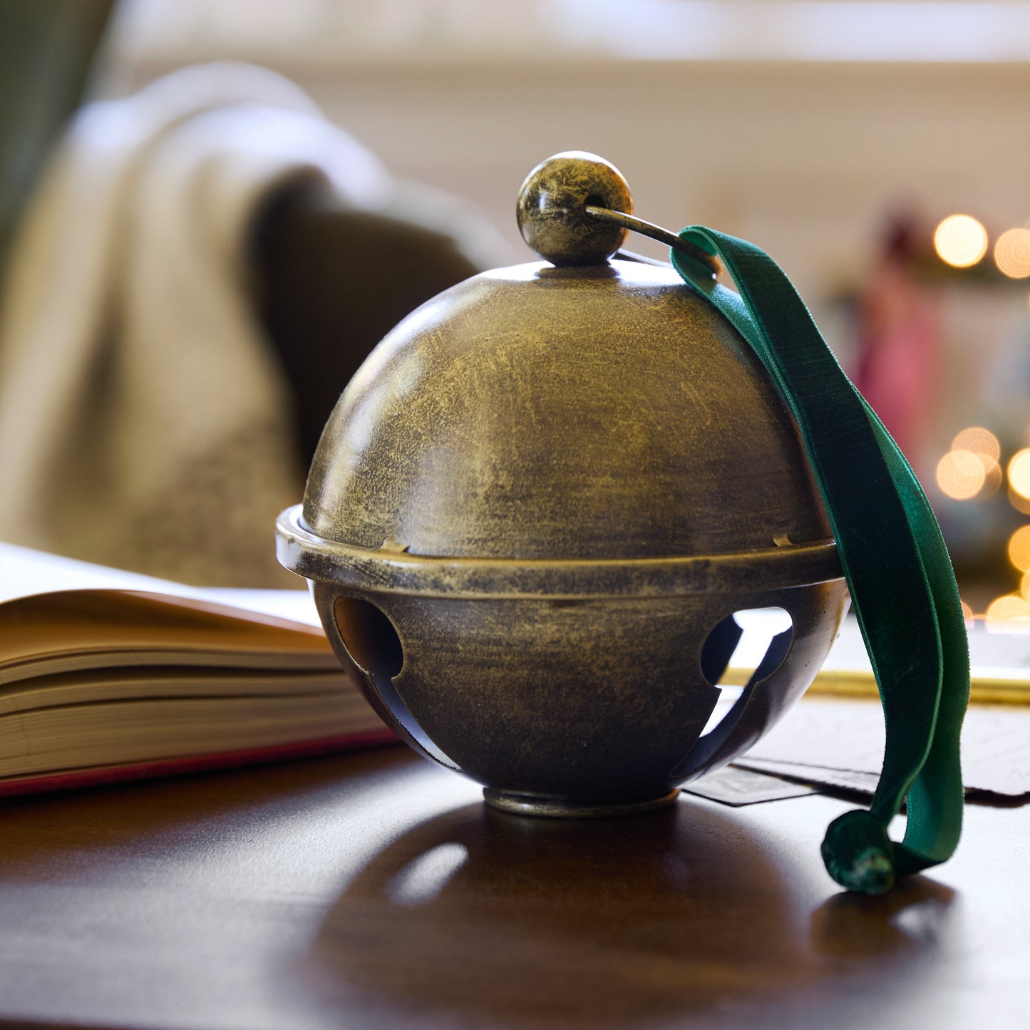 Antiqued Brass Jingle Bell Sit About in a room