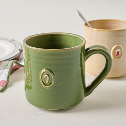 Black Oak Artisan Candy Cane Green Mug shown with other tabletop and souvenir product