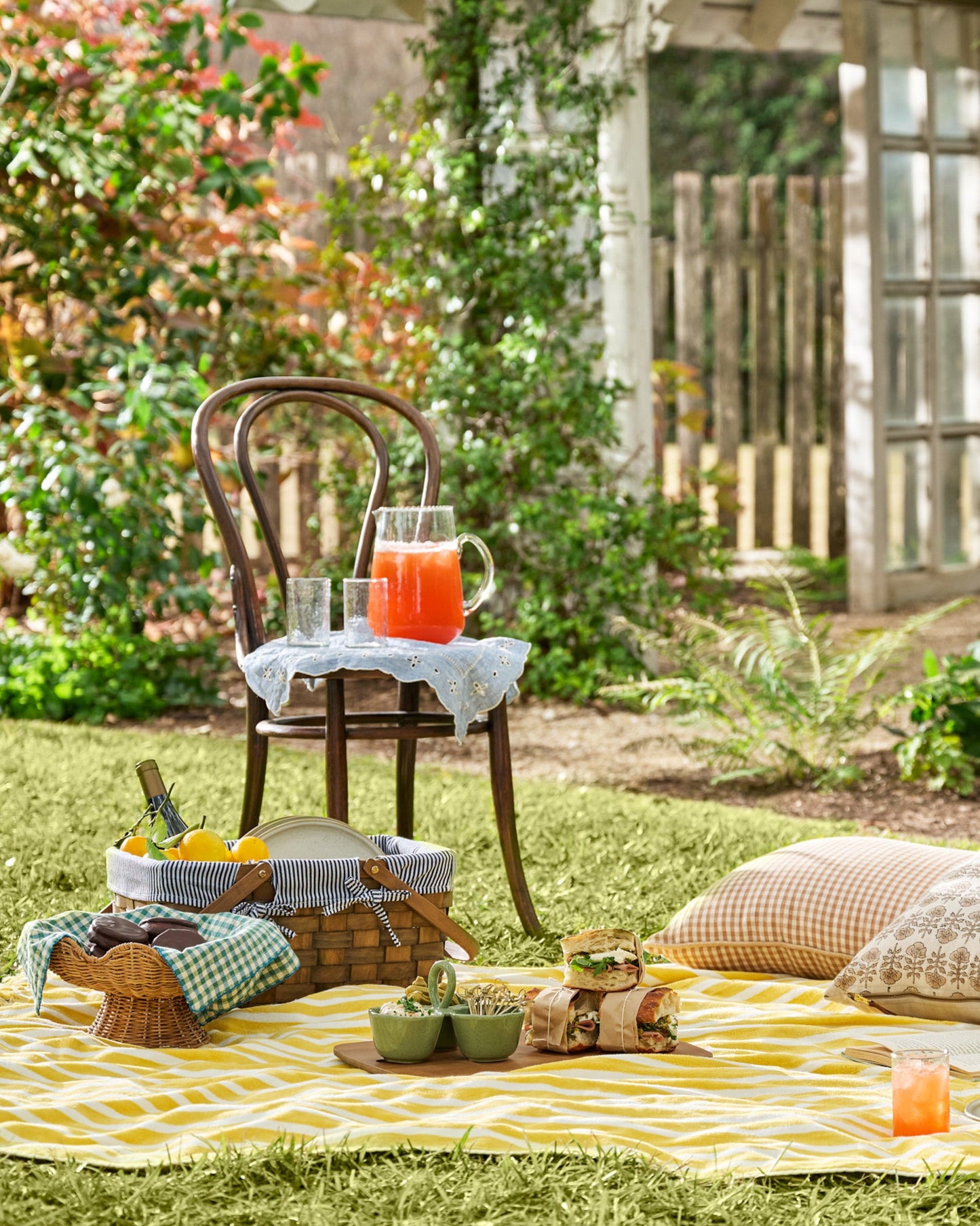Monaco Mimosa Stripe Beach & Picnic Blanket shown at a picnic