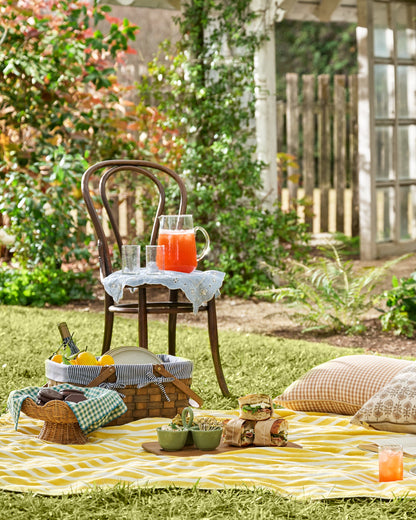 Monaco Mimosa Stripe Beach & Picnic Blanket shown at a picnic