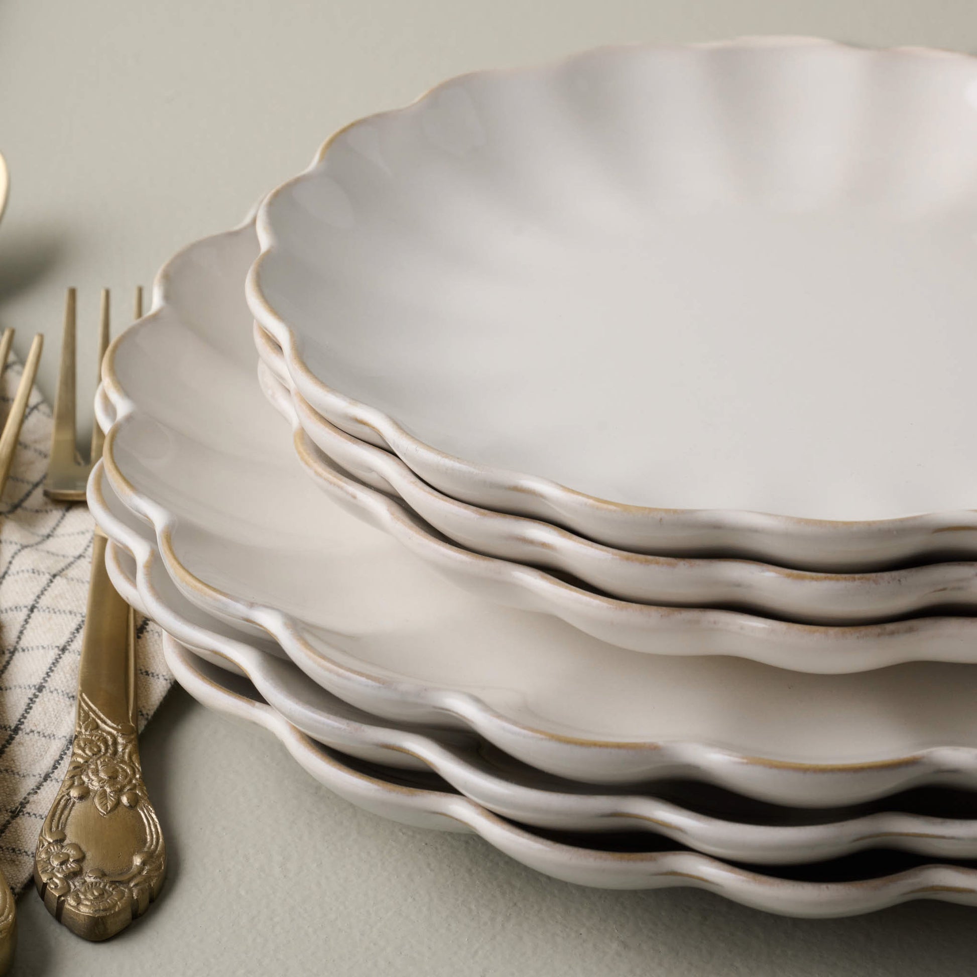 Cream Scalloped Plate dinner and dessert sizes stacked on top of each other