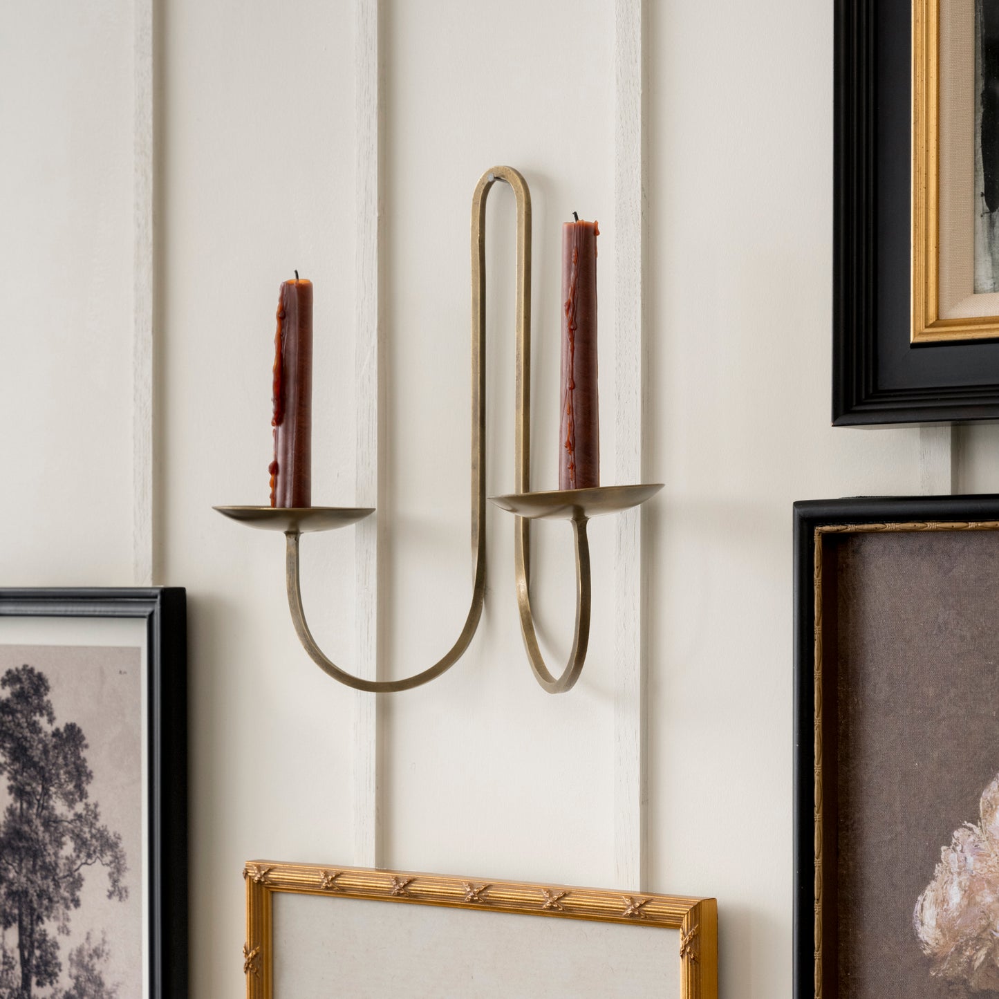 Daniel Antique Brass Candle Sconce shown with candles