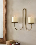 Daniel Antique Brass Candle Sconce shown with candles
