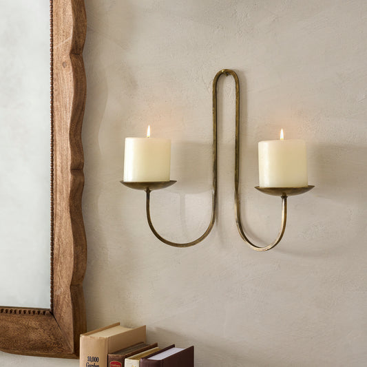 Daniel Antique Brass Candle Sconce shown with candles