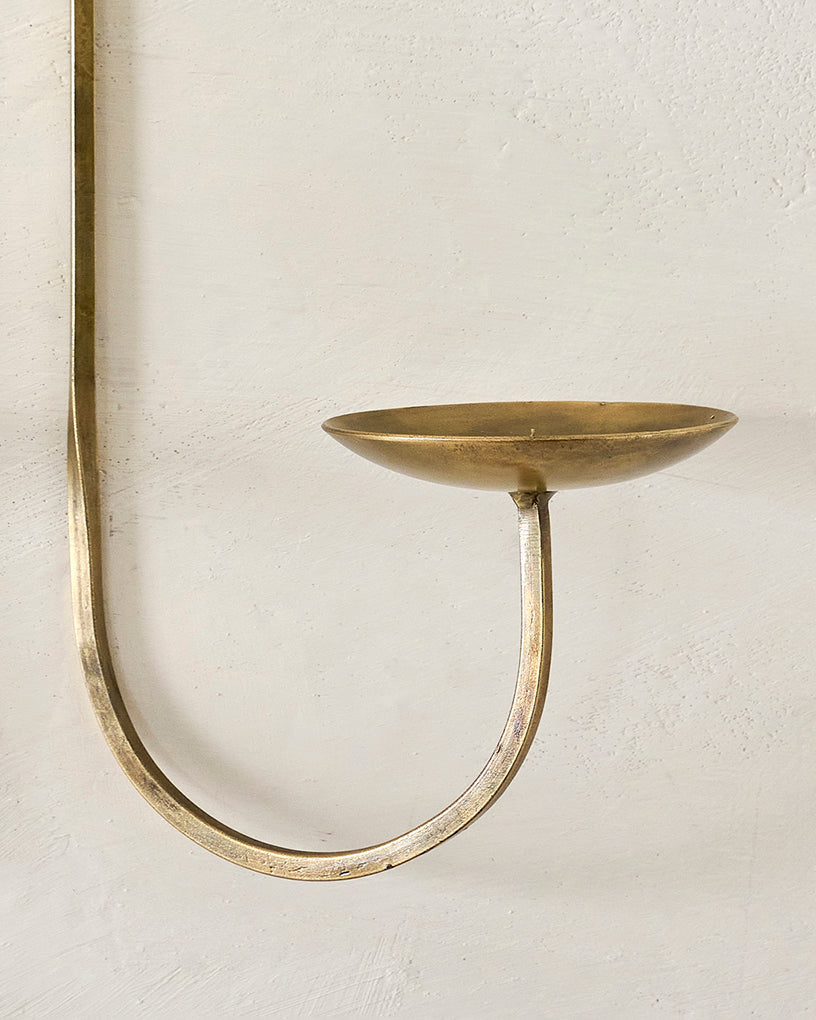 Daniel Antique Brass Candle Sconce up close showing candle spike