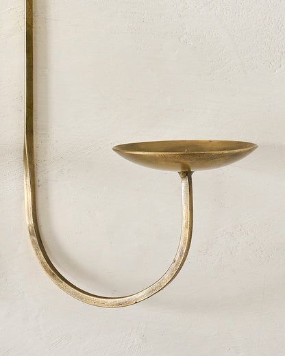 Daniel Antique Brass Candle Sconce up close showing candle spike