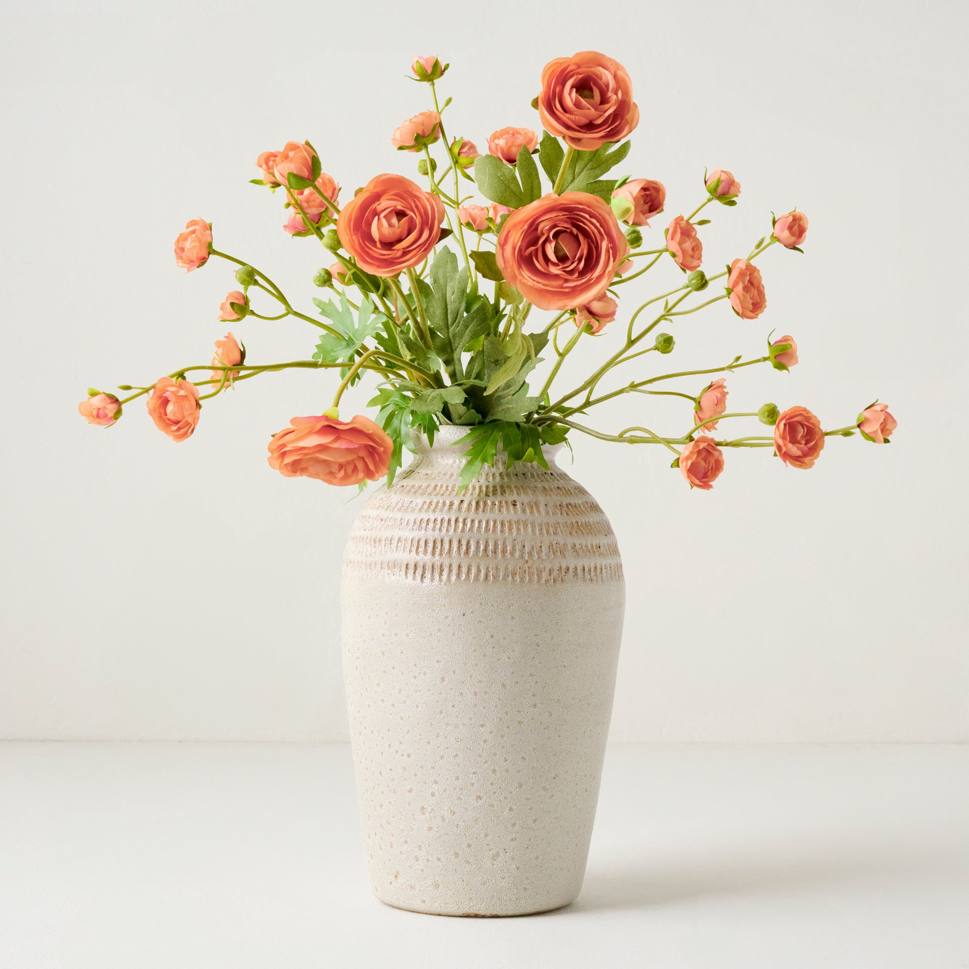 Tall Sawyer Rustic Cream Vase shown with florals