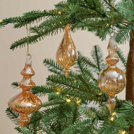 Amber Enchanted Finial Glass Ornaments, Set of 3 shown hung on tree
