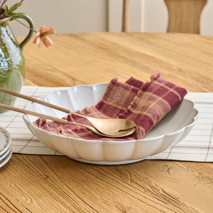 Oversized Cream Scalloped Serving Bowl shown on table