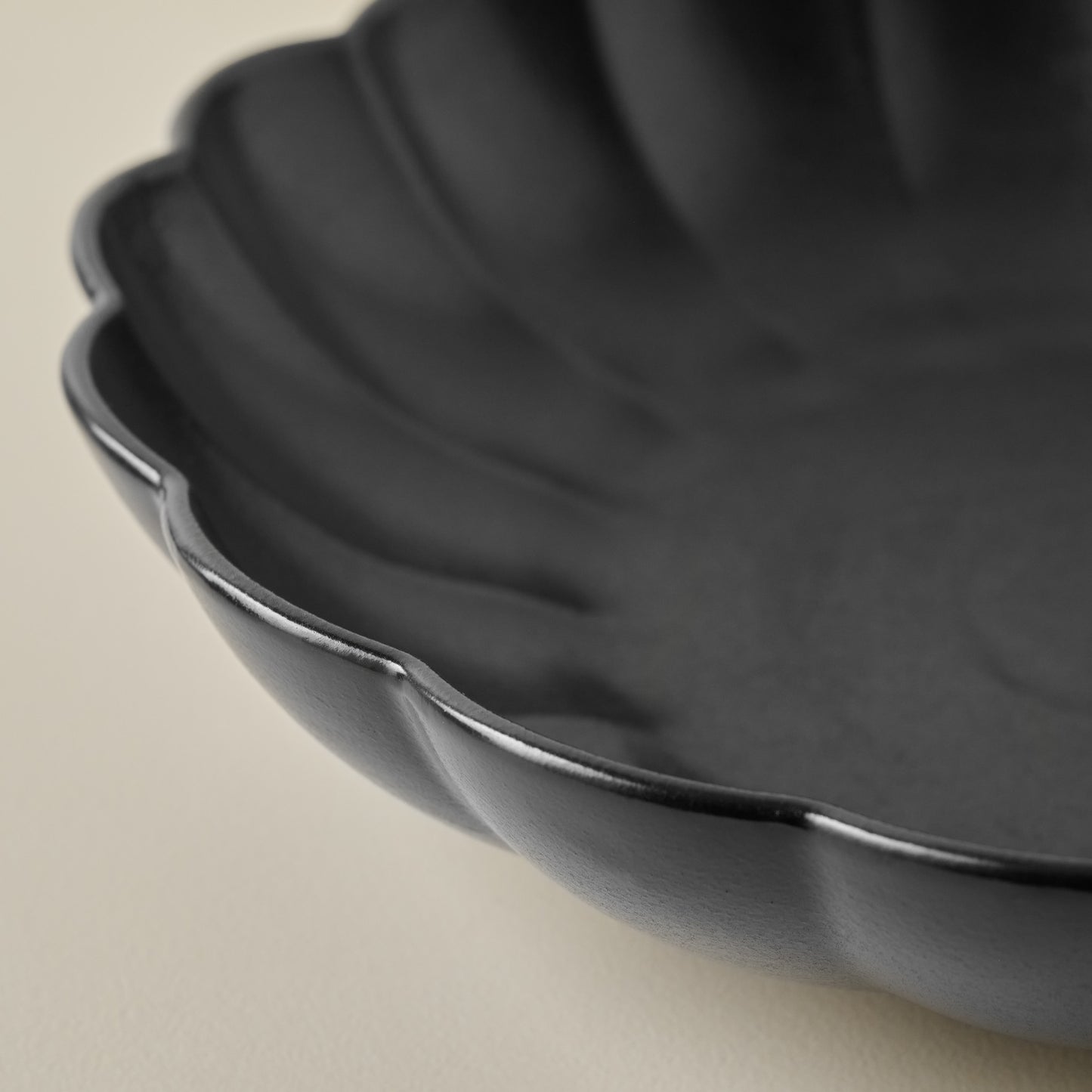 Oversized Black Scalloped Serving Bowl up close