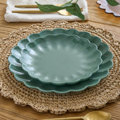 Seagrass Scalloped dessert Plate shown on table