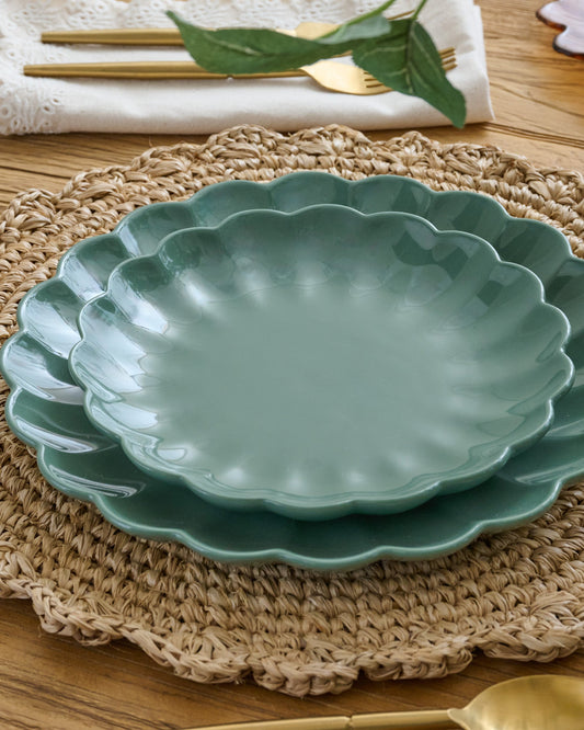 Seagrass Scalloped dessert Plate shown on table