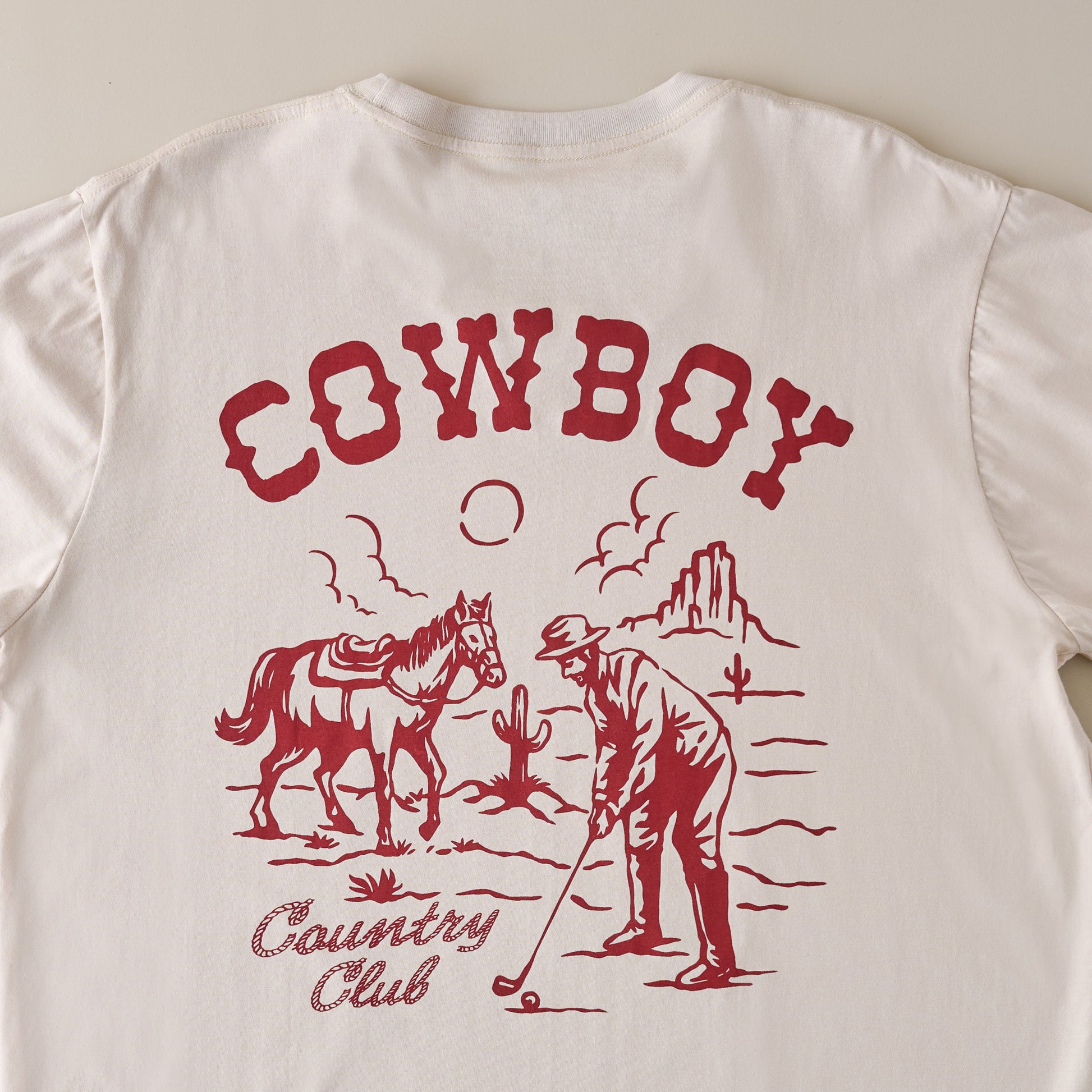 Cowboy Country Club Teeing Off Tan Shirt back