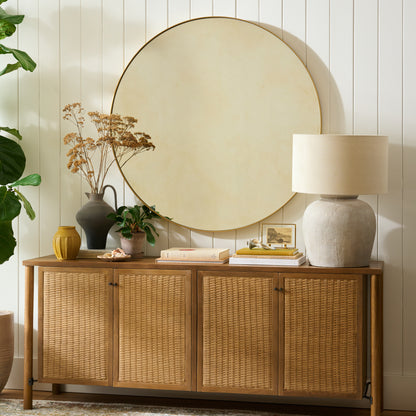 Penny Mirror above a side board on a shiplap wall