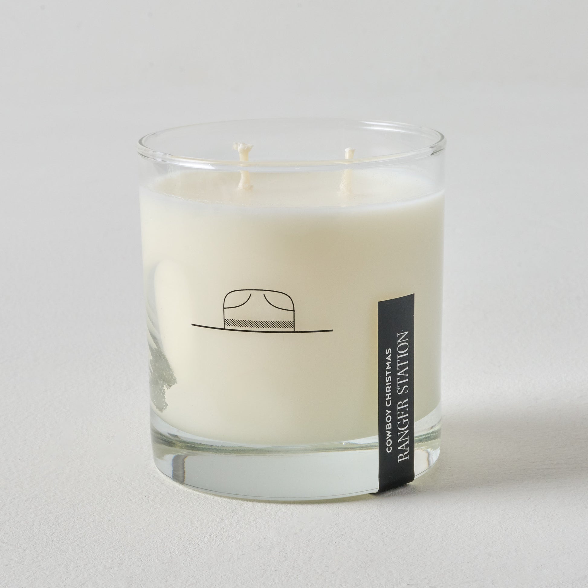 Ranger Station Cowboy Christmas Candle up close