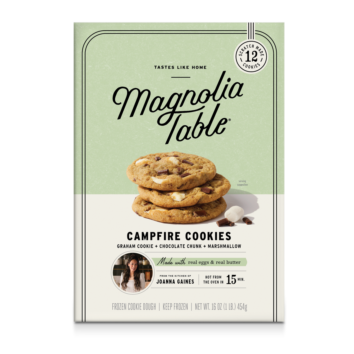 Front-facing package of Magnolia Table Campfire Cookies, showing a stack of cookies on the box with a pale sage green and cream design, plus text noting graham cookie, chocolate chunk, marshmallow, and hot from the oven.
