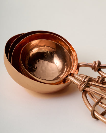 Hammered Copper Measuring Cups stacked together