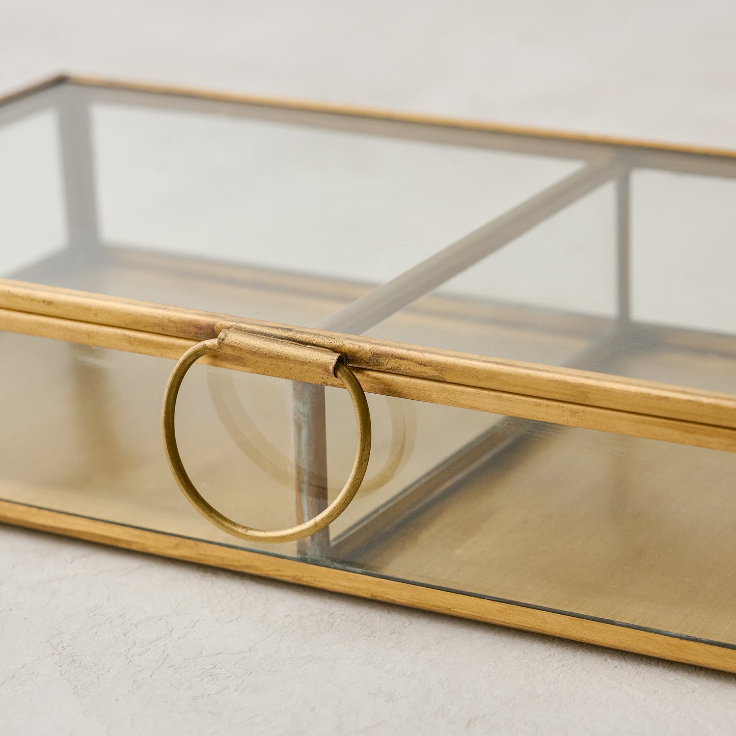 detail view of magnolia antique brass keepsake box handle