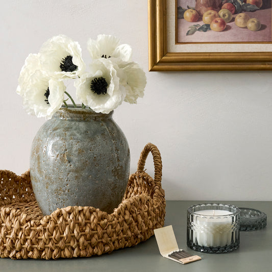White Anemone Bouquet displayed in blue ceramic vase