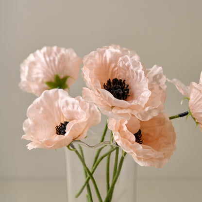 Pink Anemone Bouquet close up view in a clear vase