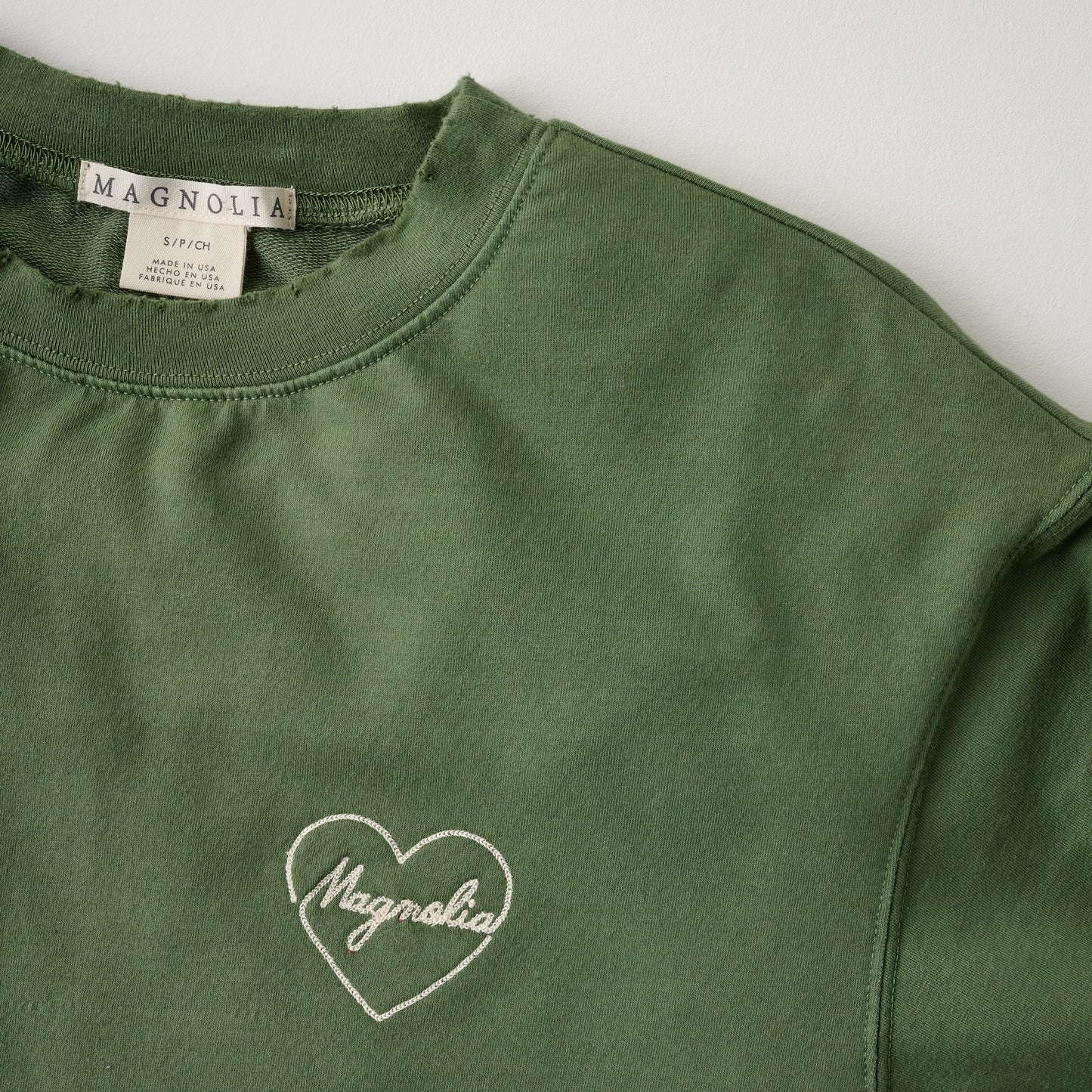Embroidered Heart Sage Sweatshirt close up