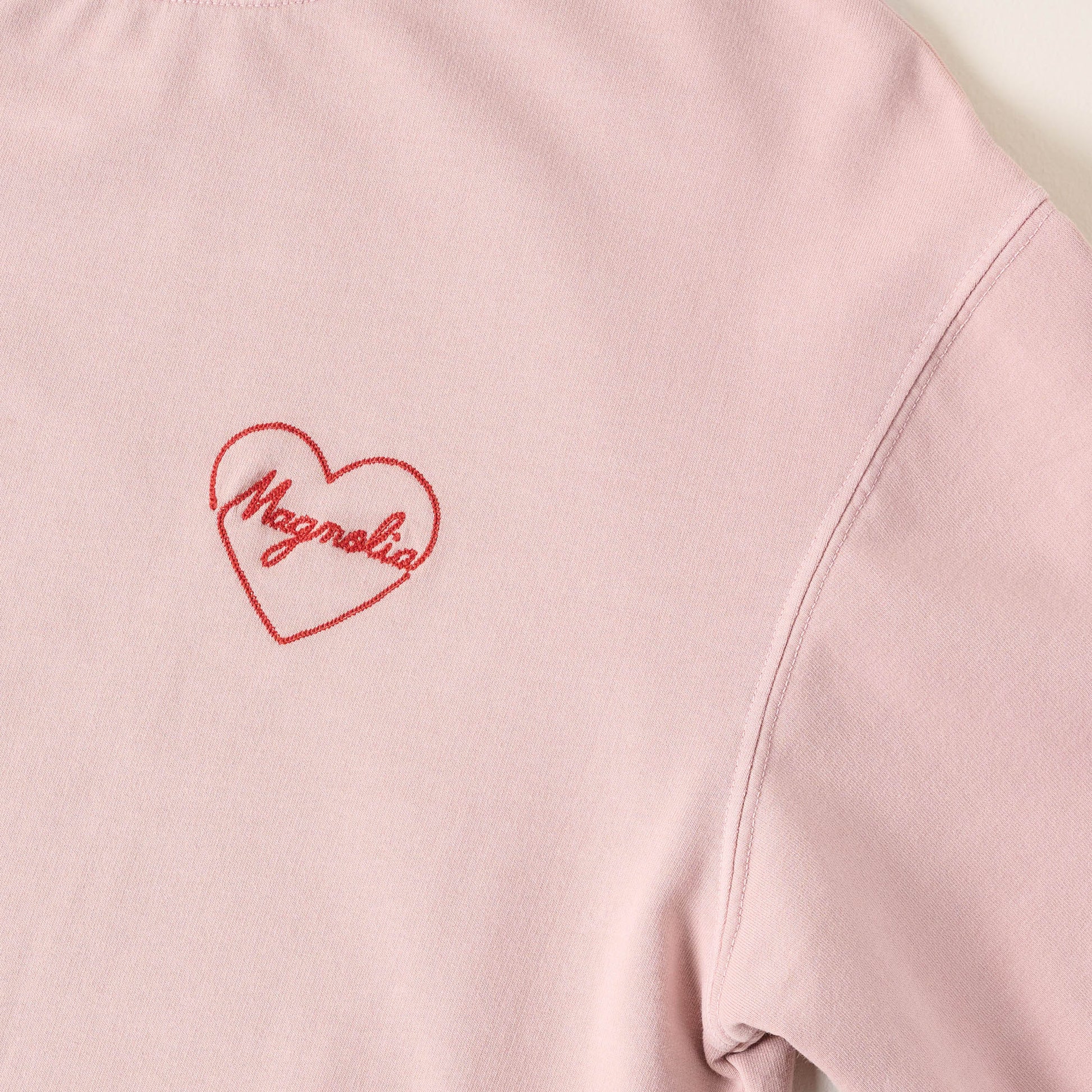 Embroidered Heart Blush Sweatshirt close up of heart design