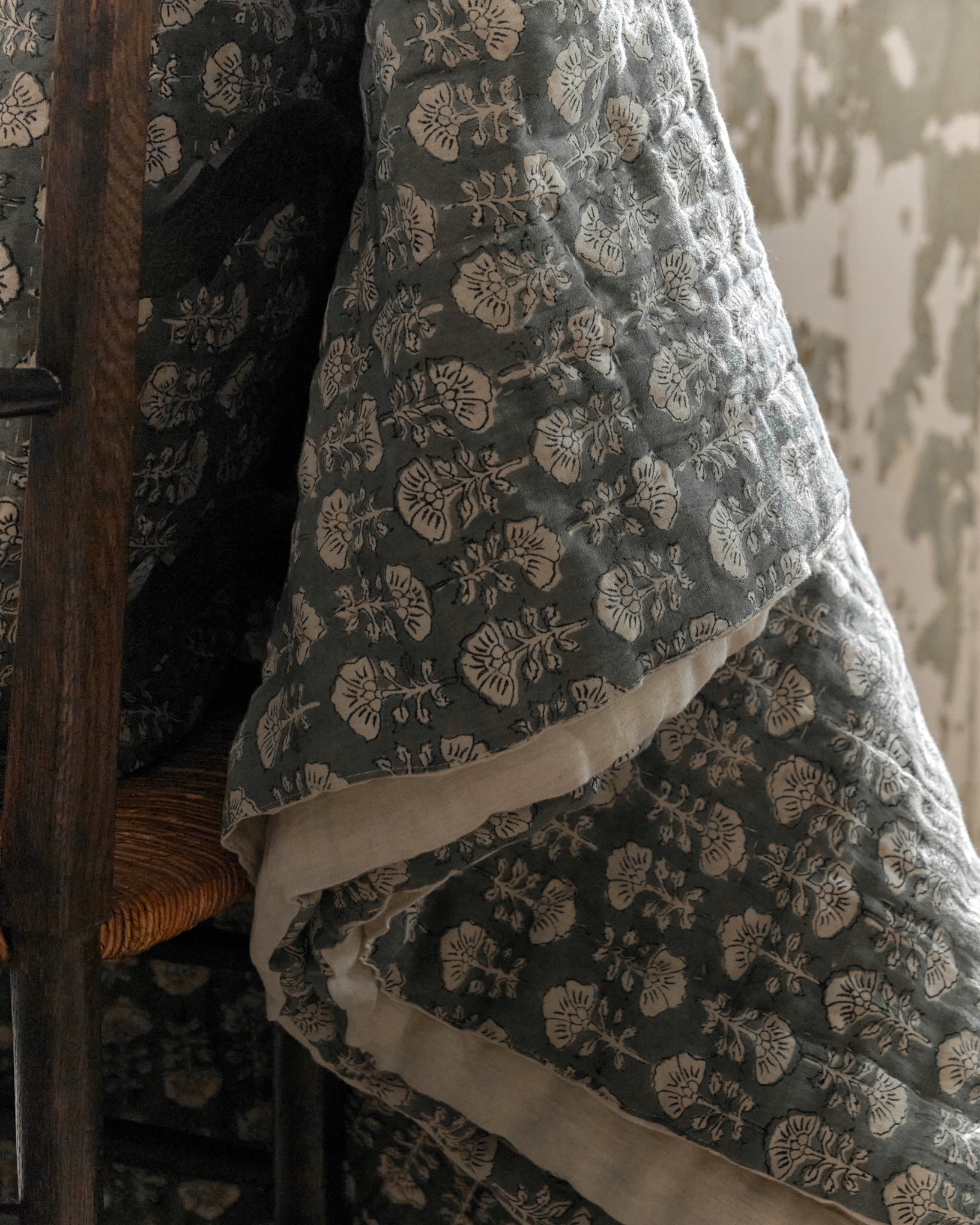 Flora Block Print Quilt - Silver Blue close up on chair