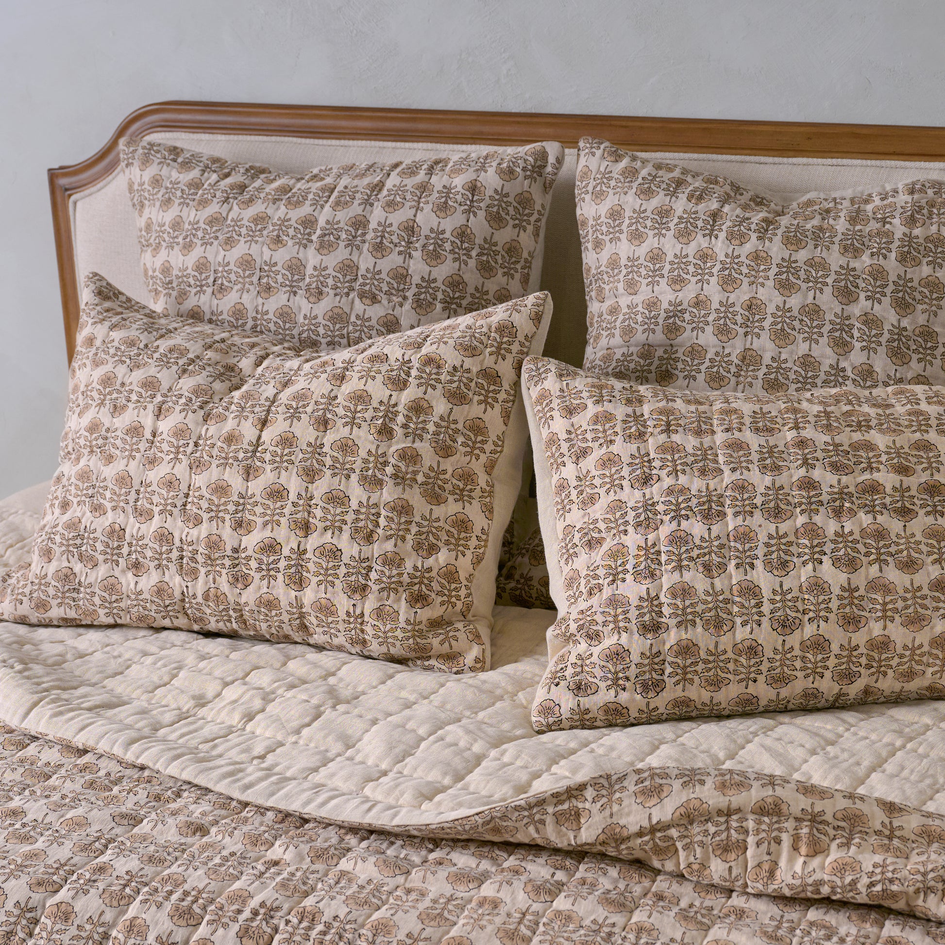 Flora Block Print Pillow Sham - Natural shown on bed