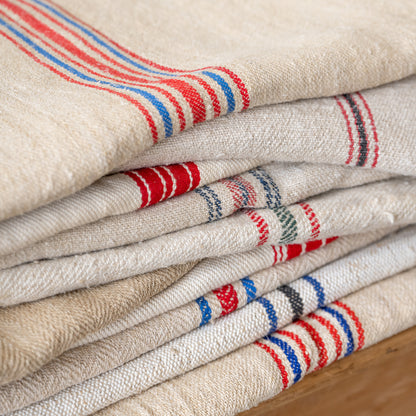 Found Assorted Grain Sacks folded, close up