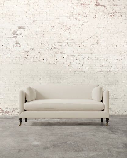 Francis 71" Sofa with Brass Casters