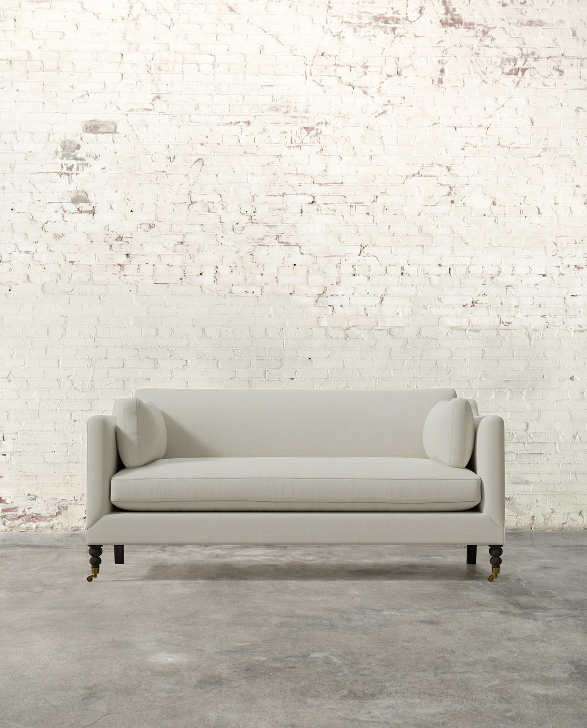 Francis 71" Sofa with Brass Casters