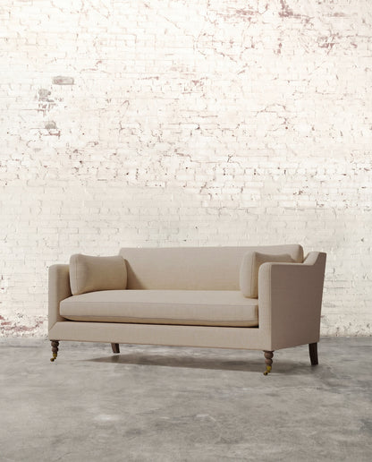 Francis 71" Sofa with Brass Casters