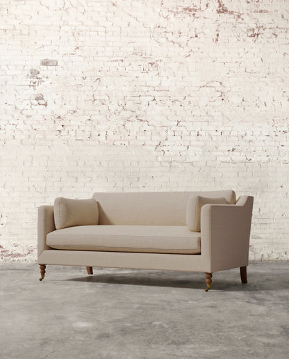 Francis 71" Sofa with Brass Casters