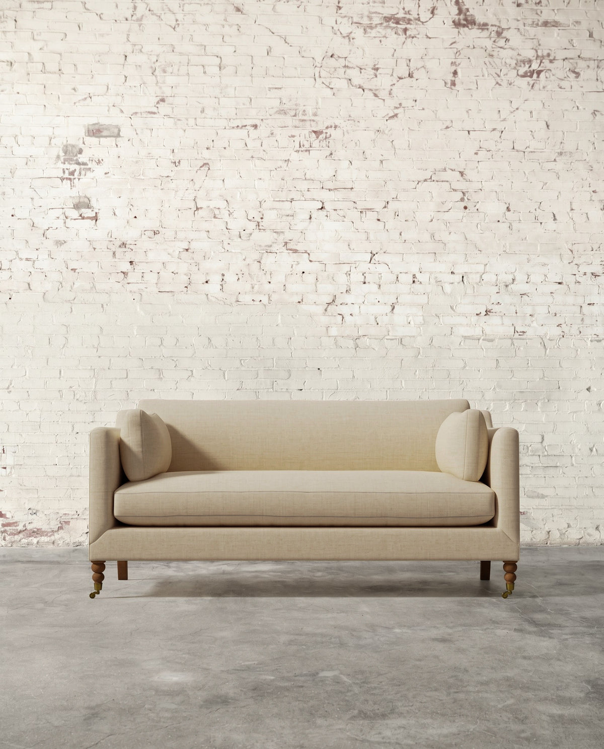 Francis 71" Sofa with Brass Casters