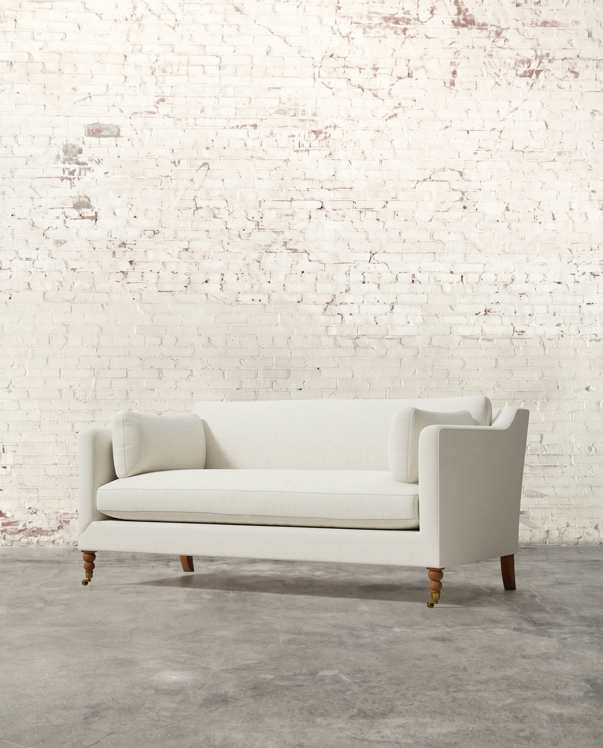 Francis 71" Sofa with Brass Casters