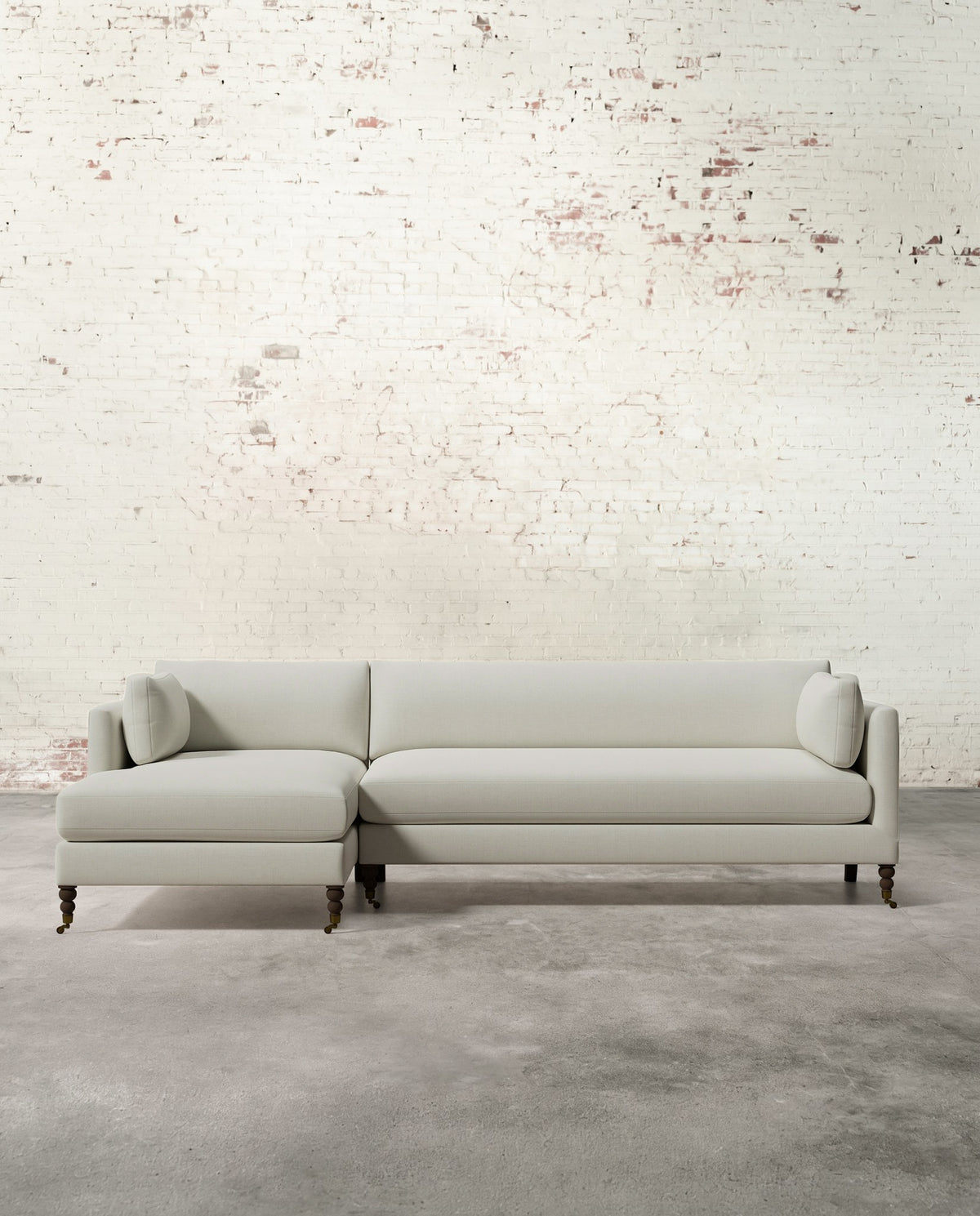 Francis Left Facing Sectional with Brass Casters