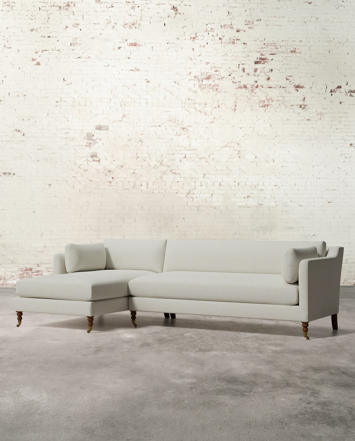 Francis Left Facing Sectional with Brass Casters